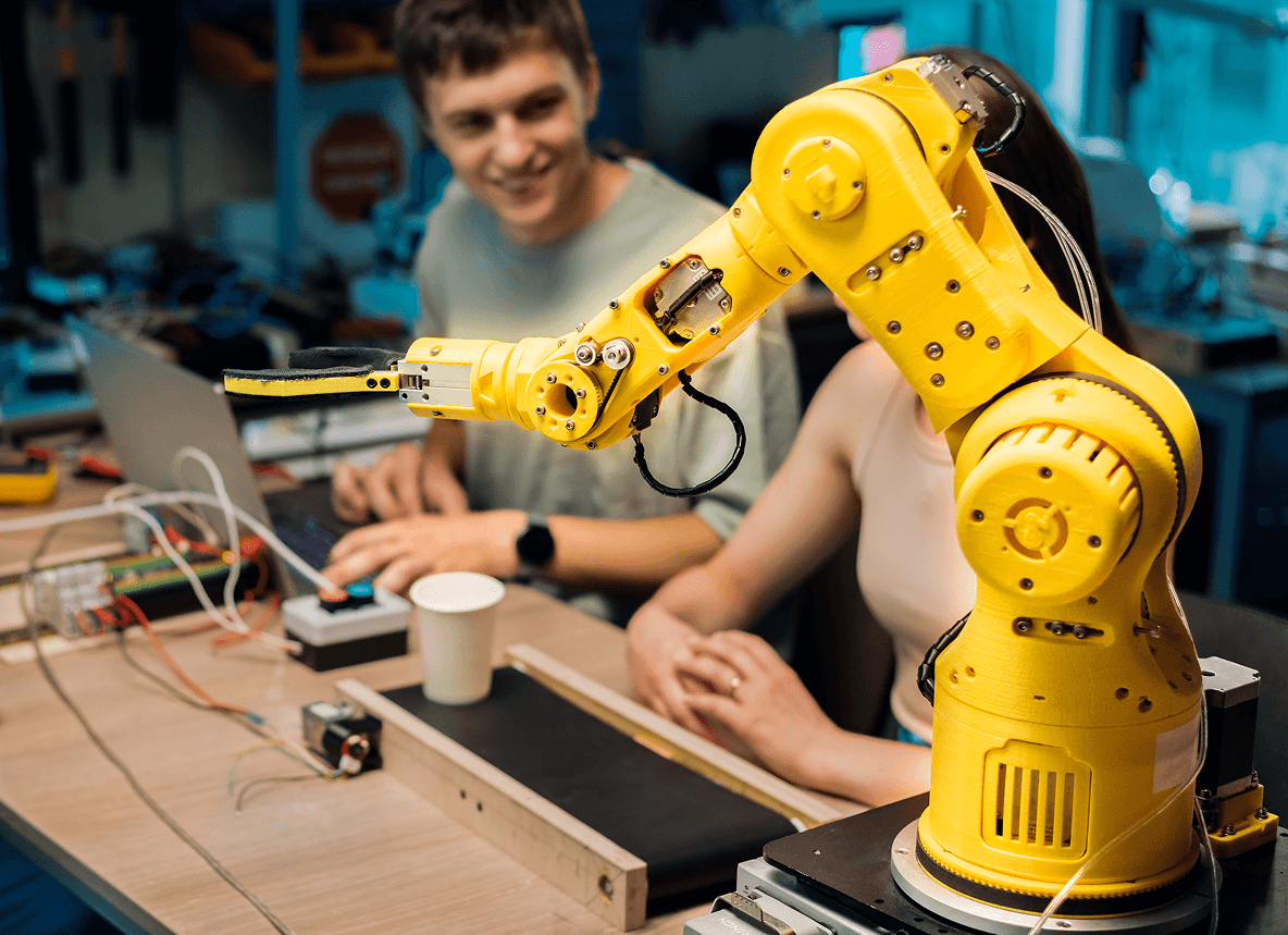 group-young-people-doing-experiments-robotics-laboratory-robot-tools-table 1 (1).png